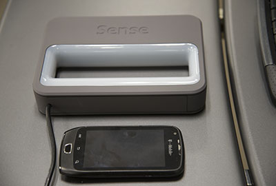 Sense 3D scanner in front of a phone